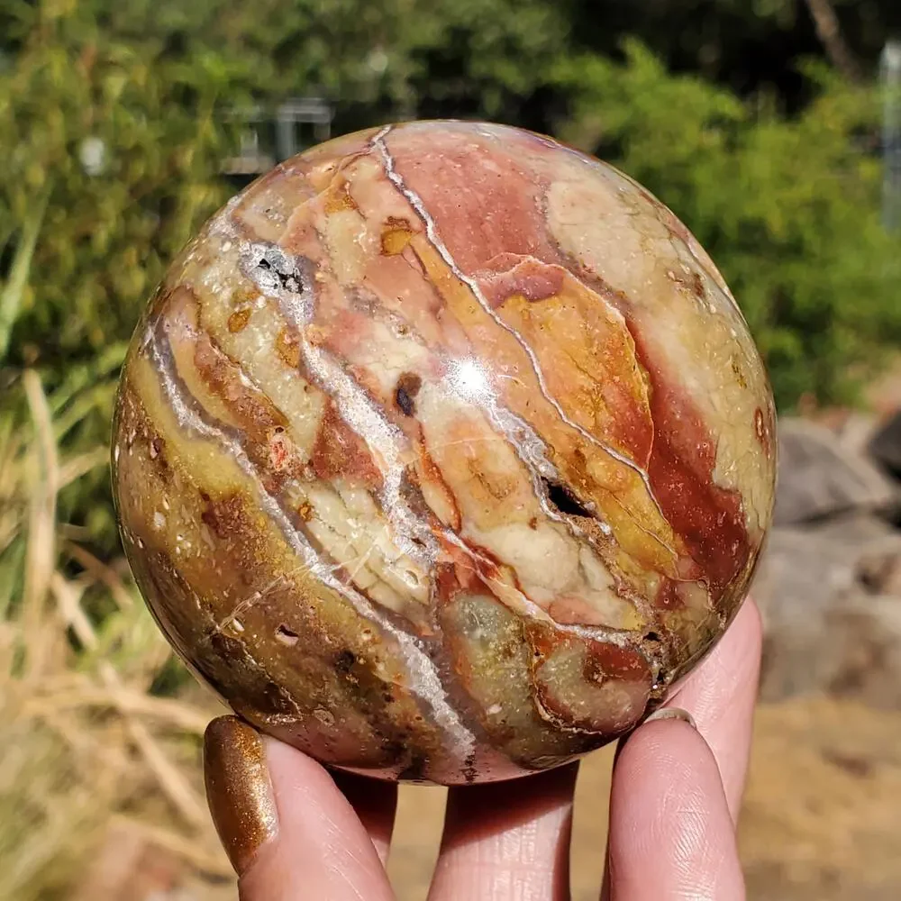 Pink Ocean Ibis Jasper Brecciated Sphere w/ Caves Druzy 458 grams 71mm